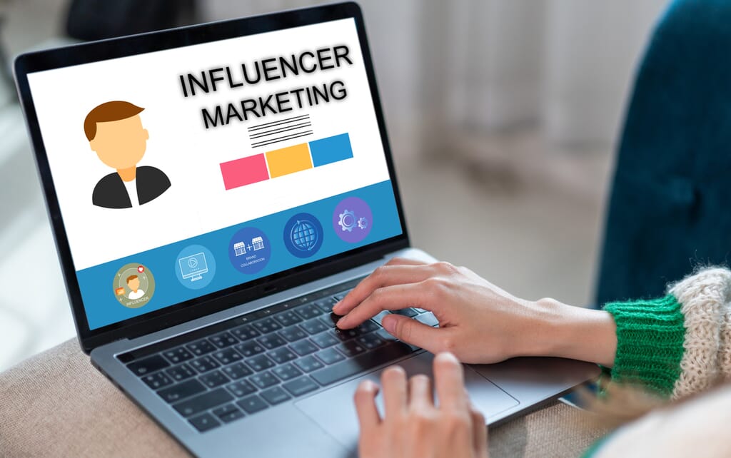 Woman use laptop with influencer marketing strategy
